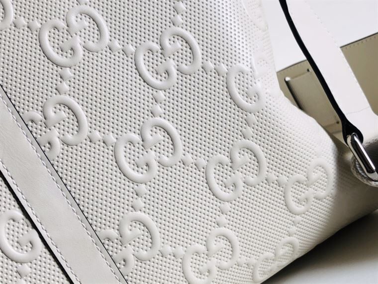 GUCCI GG EMBOSSED DUFFLE BAG - BG015