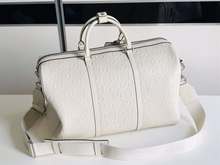 GUCCI GG EMBOSSED DUFFLE BAG - BG015