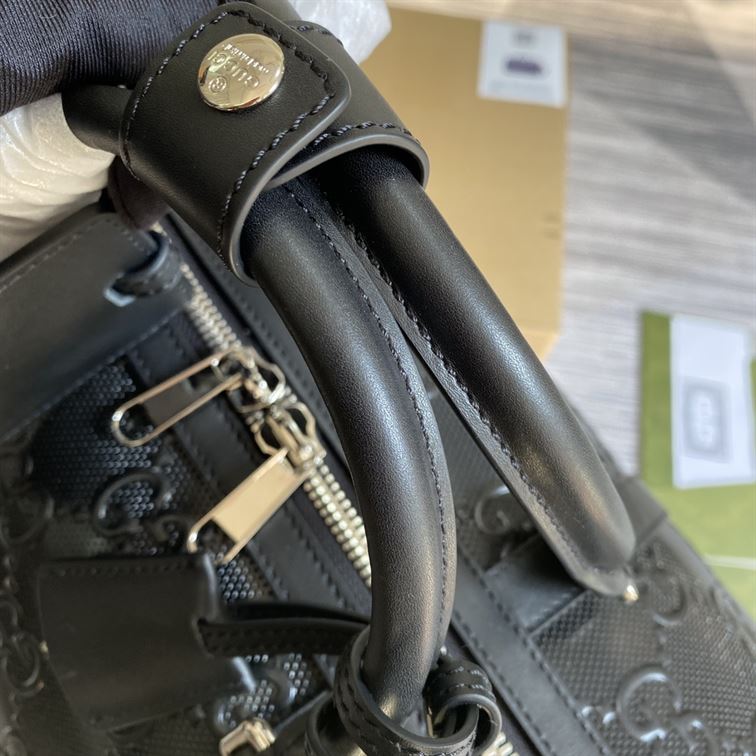 GUCCI GG EMBOSSED DUFFLE BAG - BG035