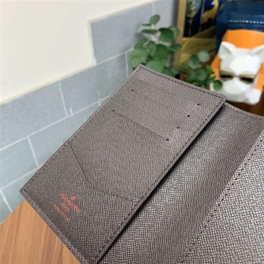LOUIS VUITTON POCKET ORGANIZER COATED CANVAS