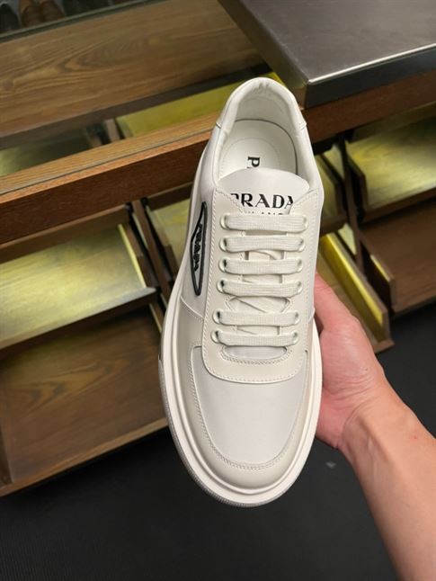 PRADA MACRO RE-NYLON AND BRUSHED LEATHER SNEAKERS - PRS056