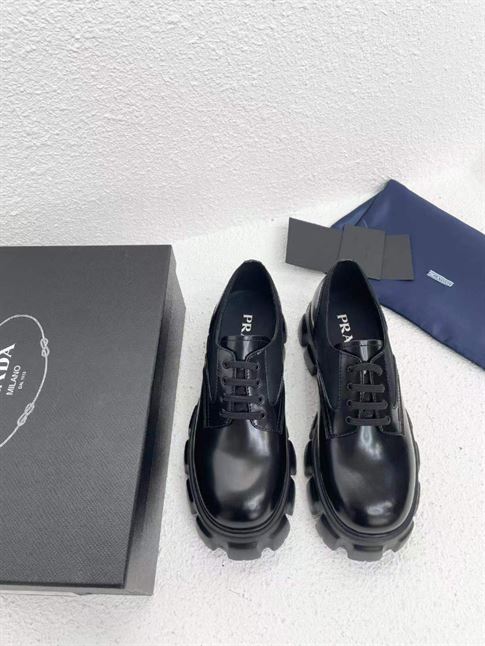 PRADA MONOLITH BRUSHED LEATHER AND NYLON LACE-UP SHOES - PRS068