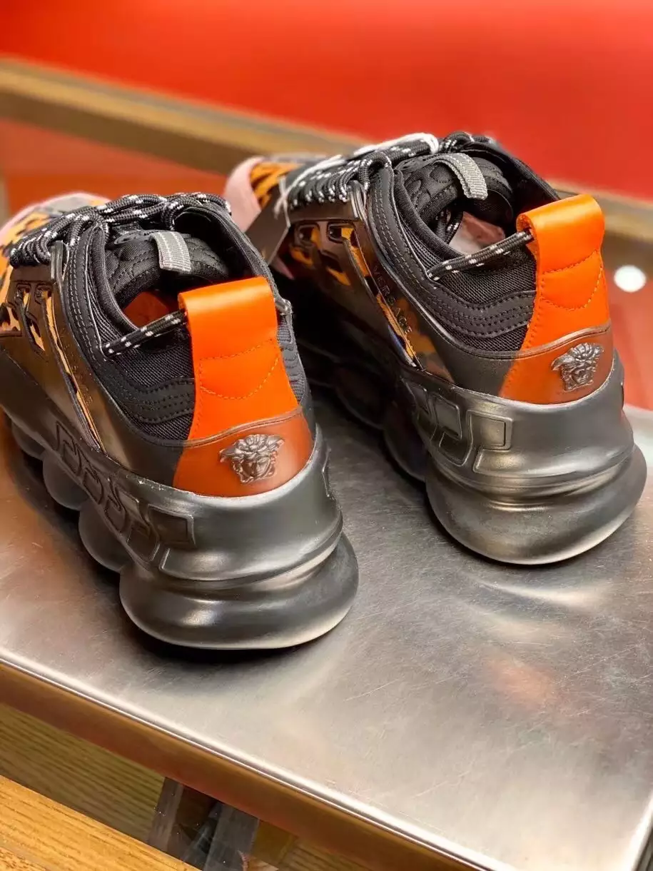 VERSACE WOMEN'S BLACK CHAIN REACTION SNEAKERS WITH LEOPARD PRINT - VSS027