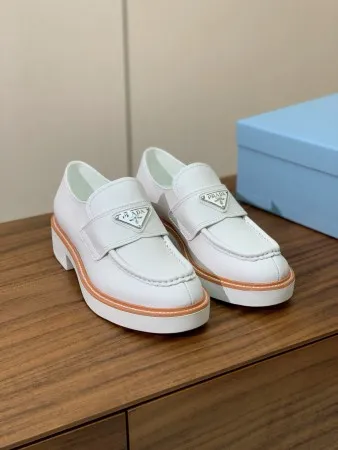Prada Women's Loafers in White Grained Leather - PRL010 Prada Women's Loafers in White Grained Leather