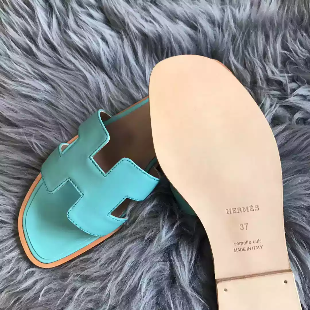 HERMES ORAN SLIDE SANDALS IN BLUE ATOLL SWIFT CALFSKIN - HMSD123