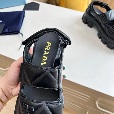 PRADA MONOLITH FLATFORM SANDALS IN BLACK NAPPA LEATHER - PSD019