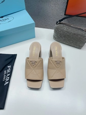 PRADA HEELED SLIDE SANDALS 65MM IN BEIGE NAPPA LEATHER - PSD037