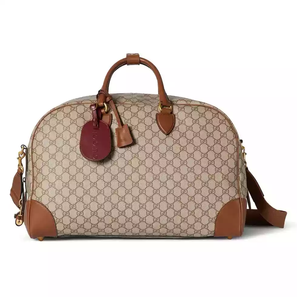 Gucci GG Canvas Medium leather-trimmed duffel bag - BG075 Gucci GG Canvas Medium leather-trimmed duffel bag