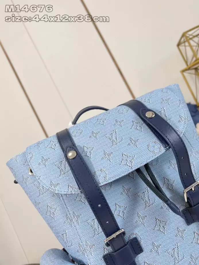 CHRISTOPHER MM BACKPACK BLUE MONOGRAM HERITAGE CANVAS M14676 - LW335 DISCOVERY BACKPACK PM SKY BLUE MONOGRAM CANVAS