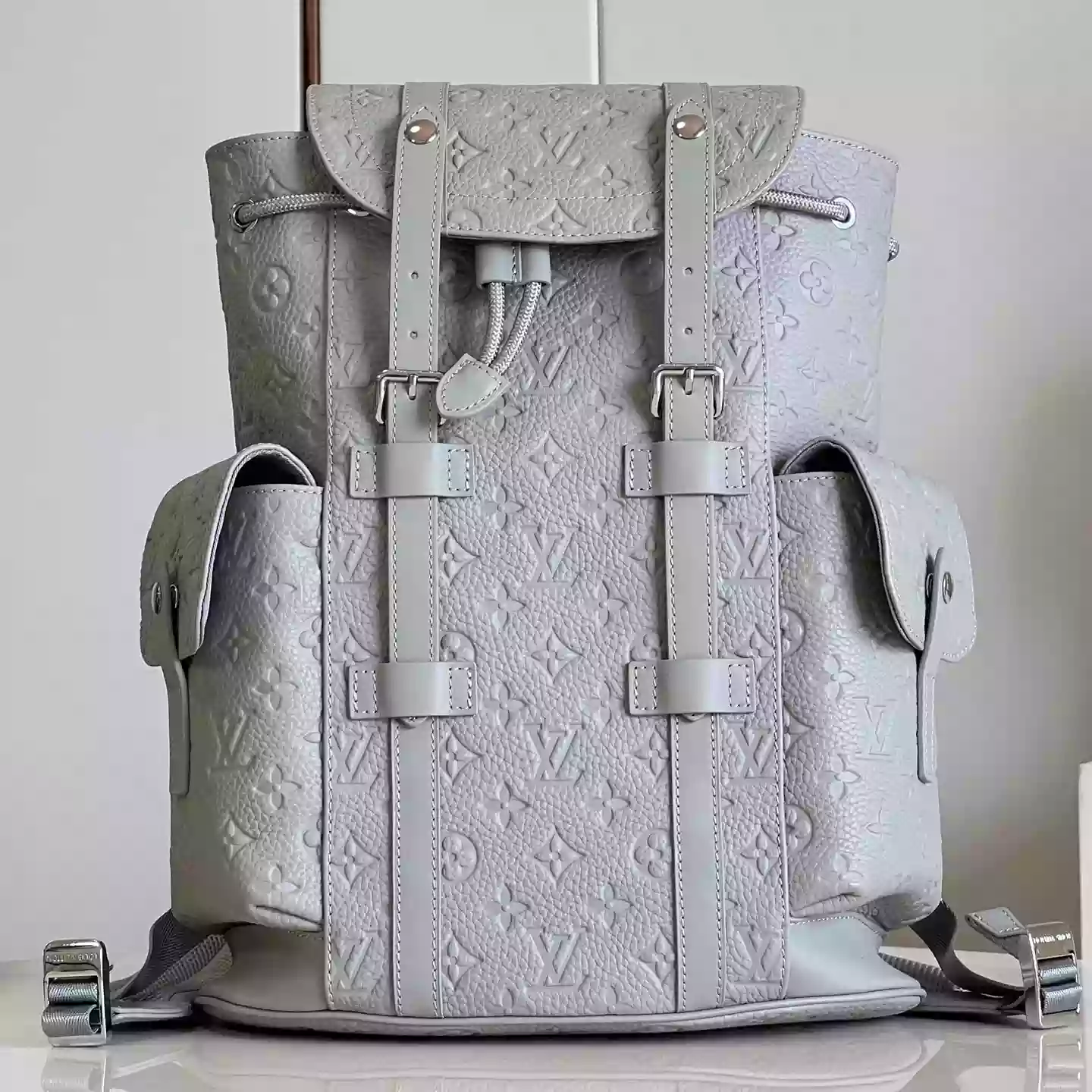 CHRISTOPHER PM TAURILLON MONOGRAM IN GREY M23146 - LW339 DISCOVERY BACKPACK PM SKY BLUE MONOGRAM CANVAS
