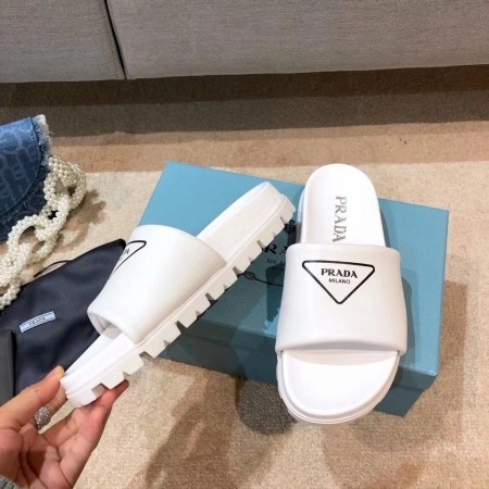 PRADA WHITE LEATHER SLIDES WITH PRINTED TRIANGLE LOGO - PSD089