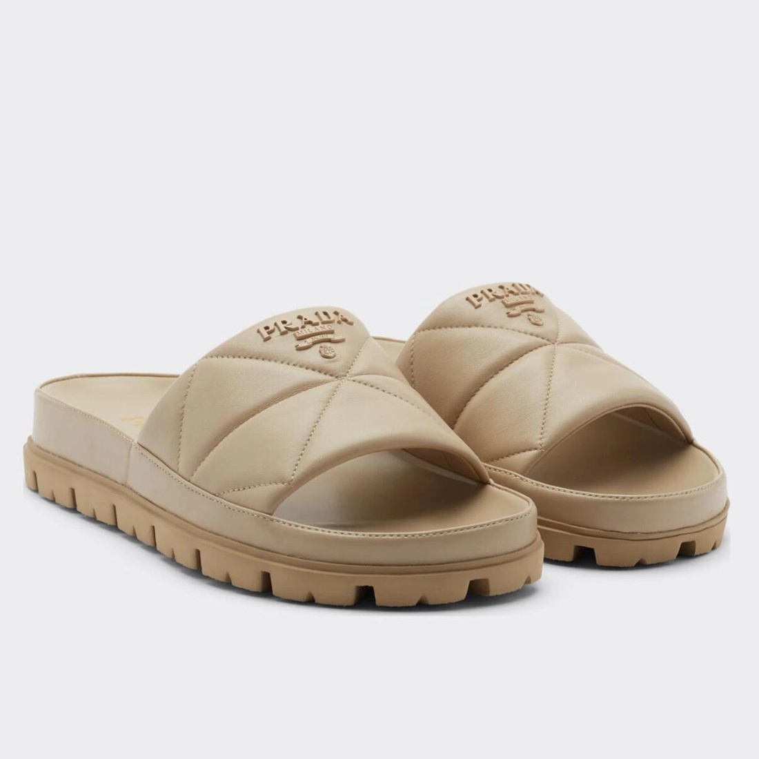 PRADA WOMEN'S SLIDES IN BEIGE QUILTED NAPPA LEATHER - PSD082