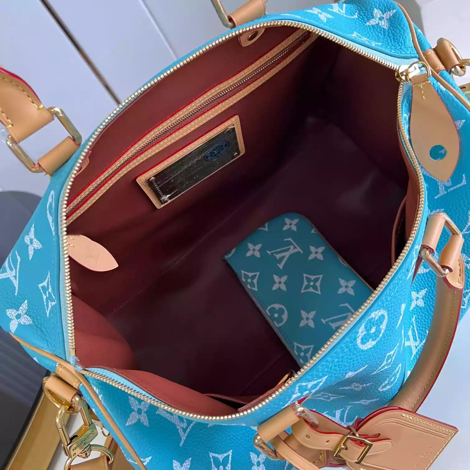 SPEEDY P9 BANDOULIERE 40 TURQUOISE M11564 - LW357 DISCOVERY BACKPACK PM SKY BLUE MONOGRAM CANVAS