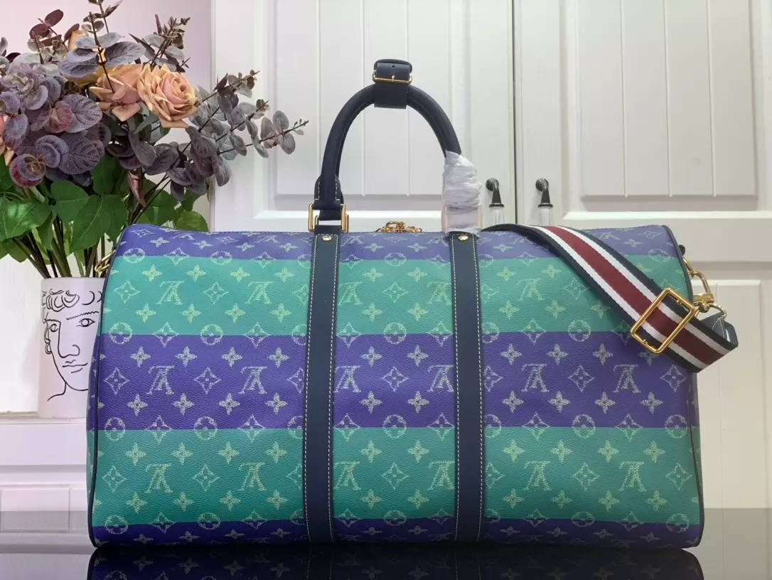 KEEPALL BANDOULIÈRE 50 LOUIS VUITTON HERITAGE - LW454 DISCOVERY BACKPACK PM SKY BLUE MONOGRAM CANVAS